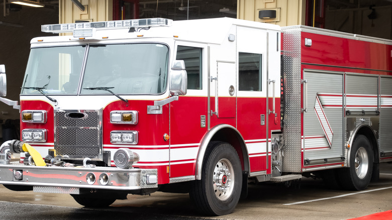 a massive fire truck parked on the road