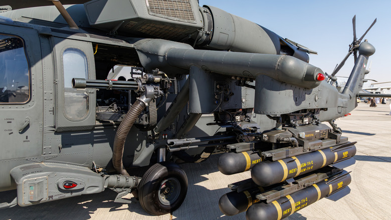 The side-mounted AGM missile system and mounted weapons on Sikorsky UH-60 Black Hawk military helicopter.