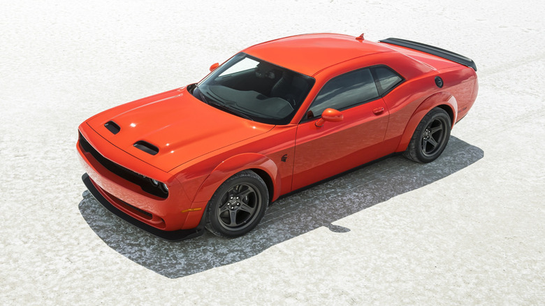 2023 Dodge Challenger SRT Super Stock in orange, front 3/4 view, high angle