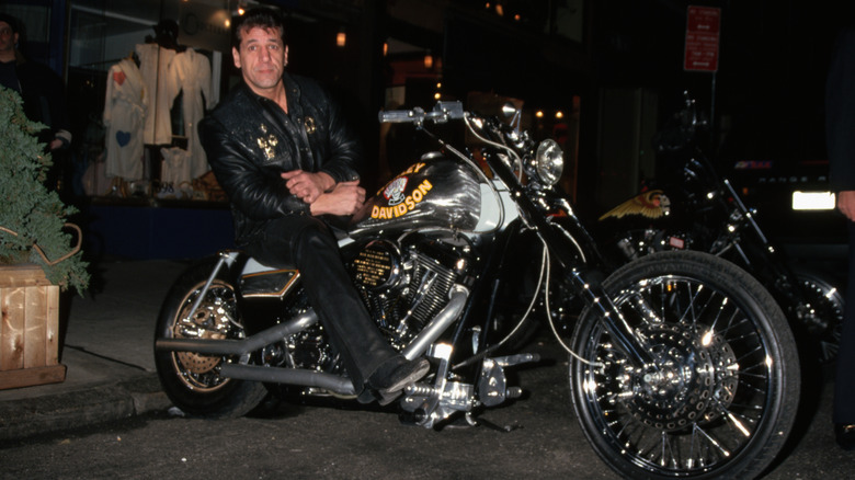 Chuck Zito, leader of the Hells Angels, sits on his Harley-Davidson motorcycle