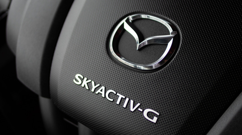 A closeup of a Mazda3 Skyactiv-G engine cover