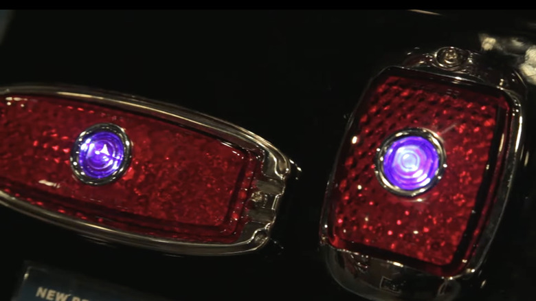 blue led lens on red motorcycle tail light