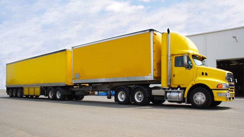 Yellow B-double truck in Australia