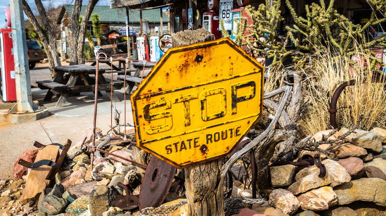 A vintage yellow stop sign along U.S. Route 66