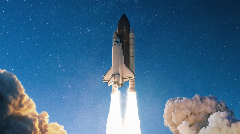 A rocket launching into space.