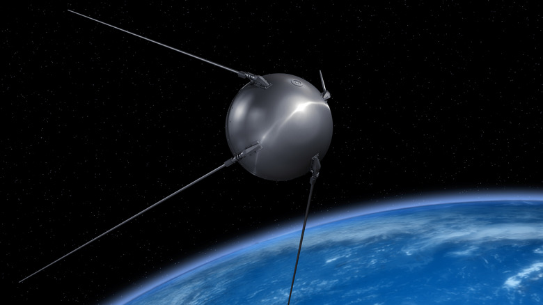 The USSR's Sputnik satellite orbiting Earth.
