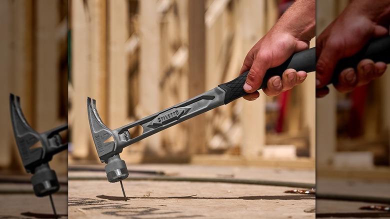 Hand hammering nail into wood with Stiletto hammer