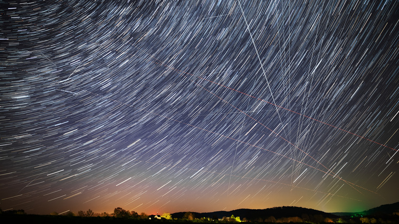 Starlink satellites streaks night sky