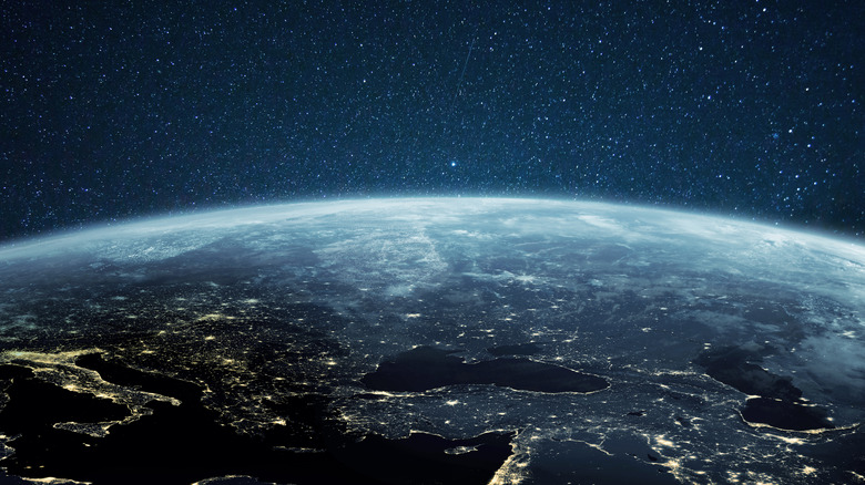 Stars in space over Earth
