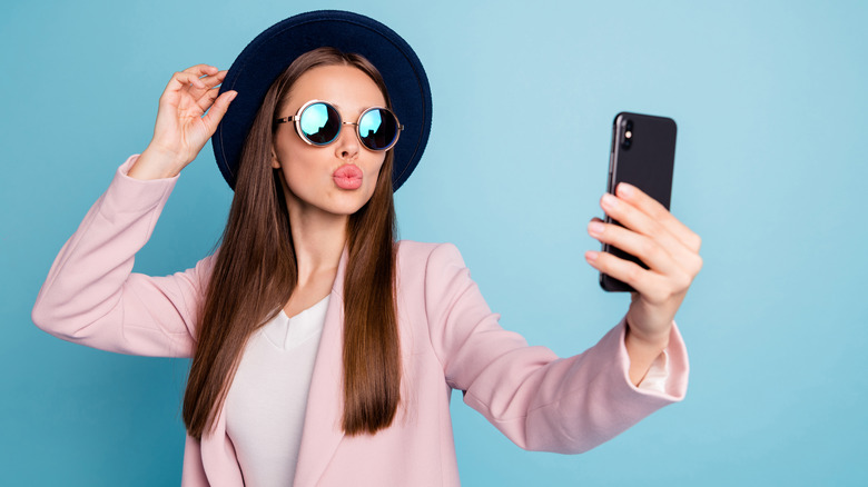 Woman taking selfie