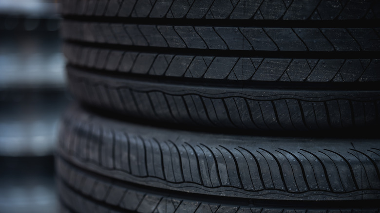 two tires stacked horizontally in shop