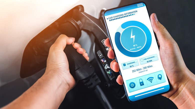 User monitors EV charge smartphone