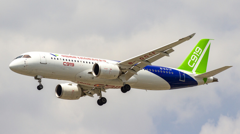 C919 Airliner in flight with landing gear down