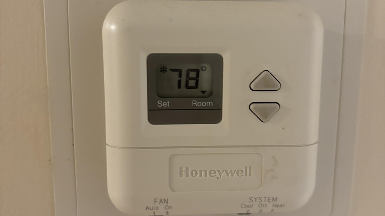 A home thermostat set to 78 degrees Fahrenheit.