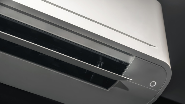A running wall-mounted air conditioner unit.