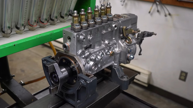 close-up view of a 5.9 Cummins P7100 Fuel Injection Pump for 1994-1998 12 Valve Dodge Cummins on a stand