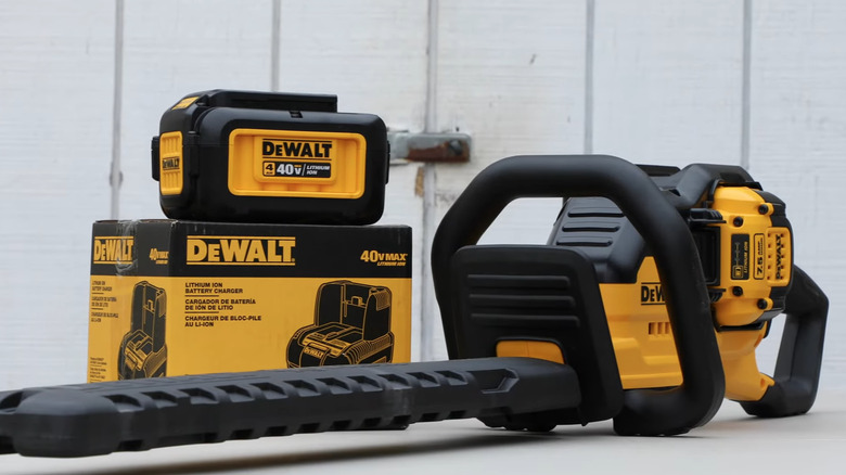 DeWalt 40V Max hedge trimmer, battery, and charger
