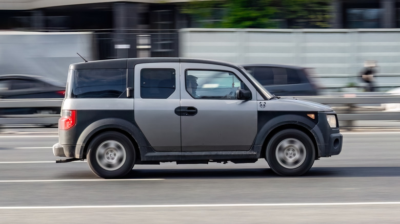 Side shot of a gray Honda Element