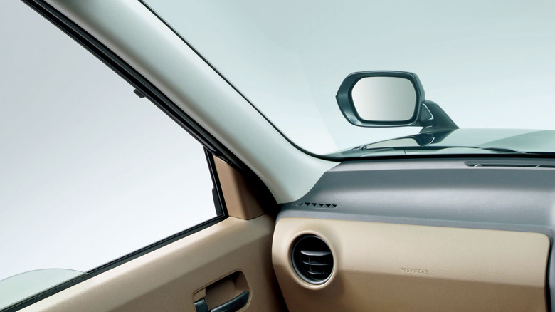 Hood mirror on the Toyota JPN Taxi.