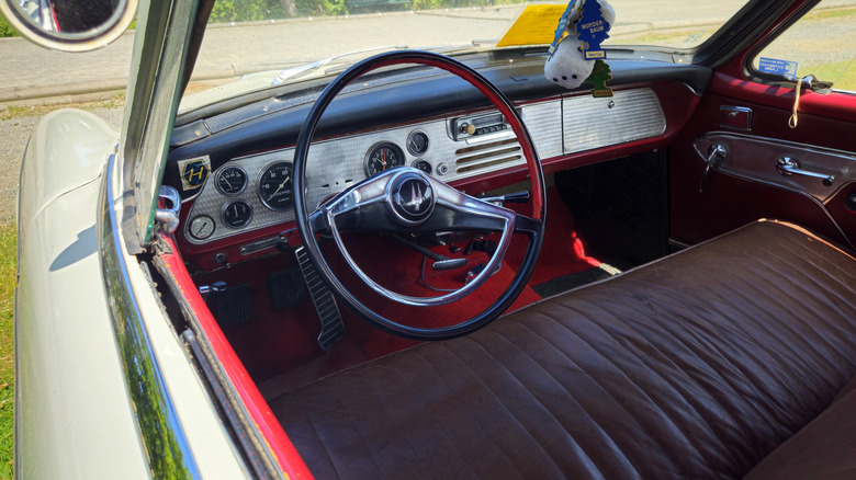 A bench front seat in a vintage car