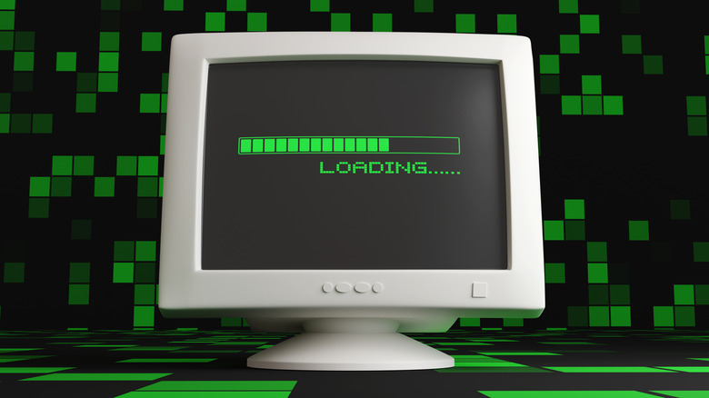 Retro CRT computer monitor showing a green progress bar and the word LOADING in checkered background.
