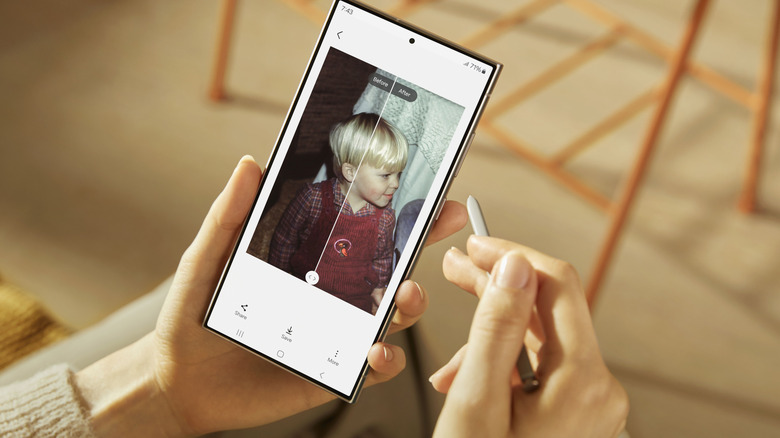 Person editing a photo with S Pen on a Samsung Galaxy S24 Ultra