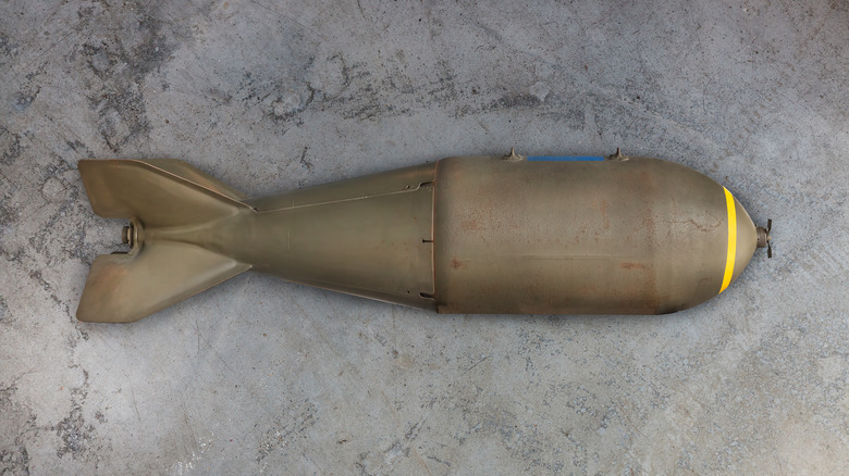 A World War II-era bomb with a propeller on the front.