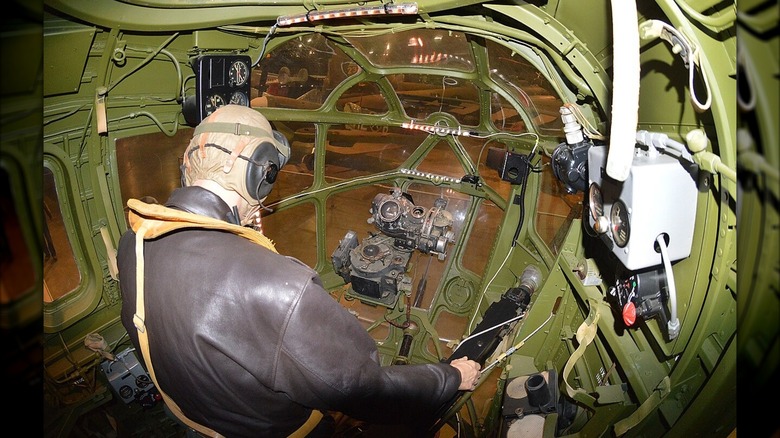 A bombardier seated in a Consolidated B-24D parked at the National Museum of the U.S. Air Force.