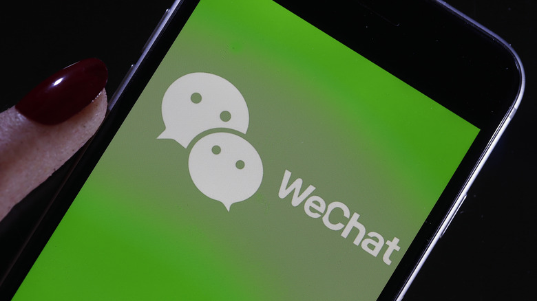 WeChat logo on a smartphone.