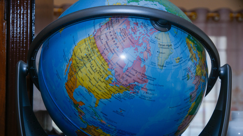 Globe on desktop shows the Americas