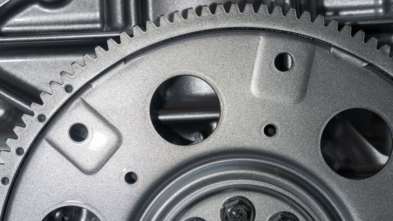 Close-up of the top half of a flex plate installed in vehicle