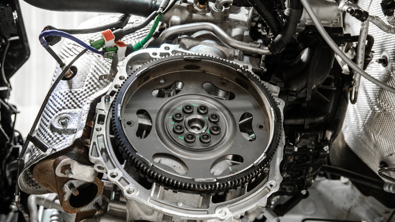 Flex plate installed in car, undercarriage mechanical partsshown
