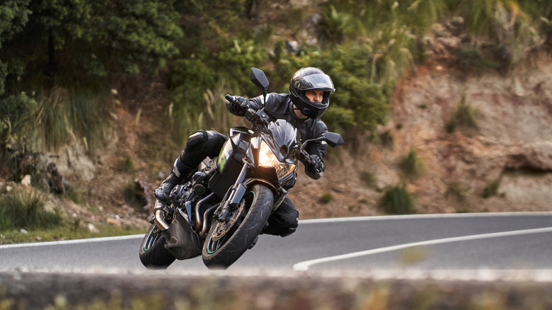 Biker leaning while turning a corner