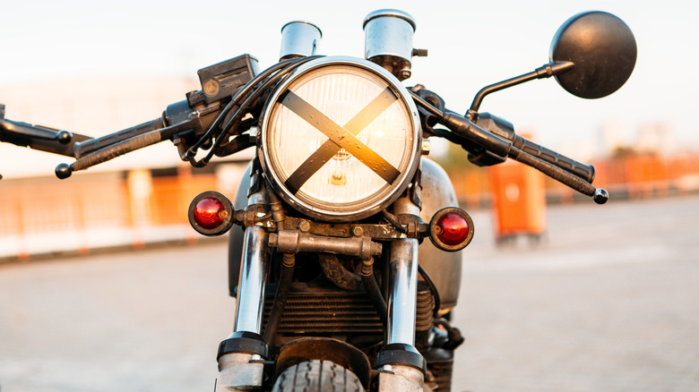 A vintage bike with X design using black tape