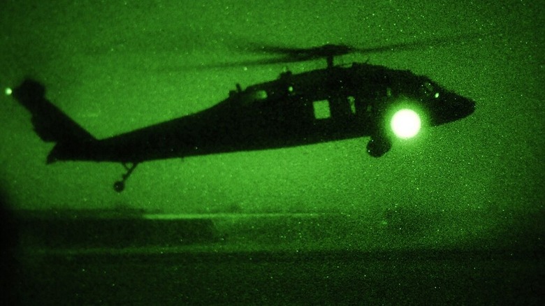 A UH-60 Black Hawk prepares to land to extract U.S. Army Soldiers from a night mission during Falcon Fury 6 in the Central Region of Iraq.
