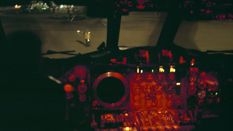 Interior of a naval jet cockpit at night