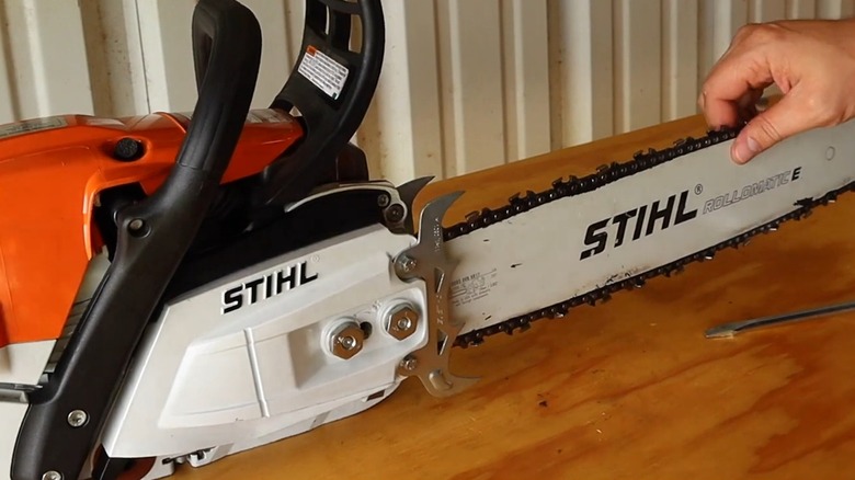 A STIHL chainsaw with bumper spikes installed