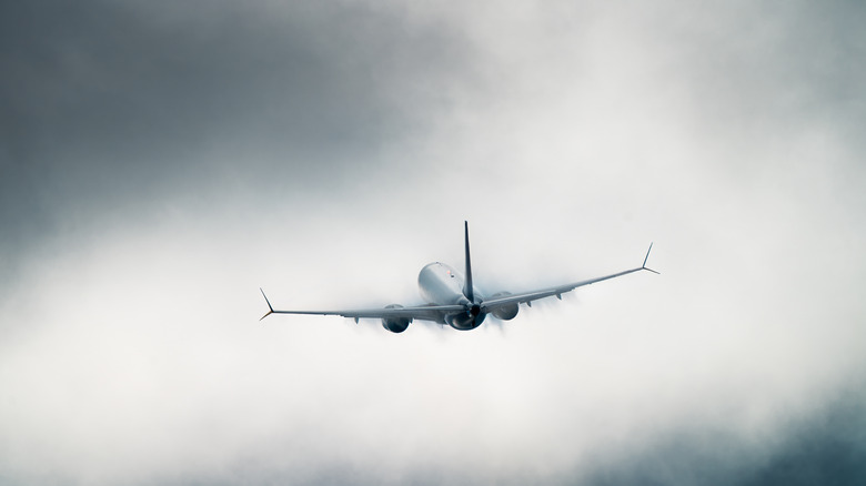 airplane flying in bad weather