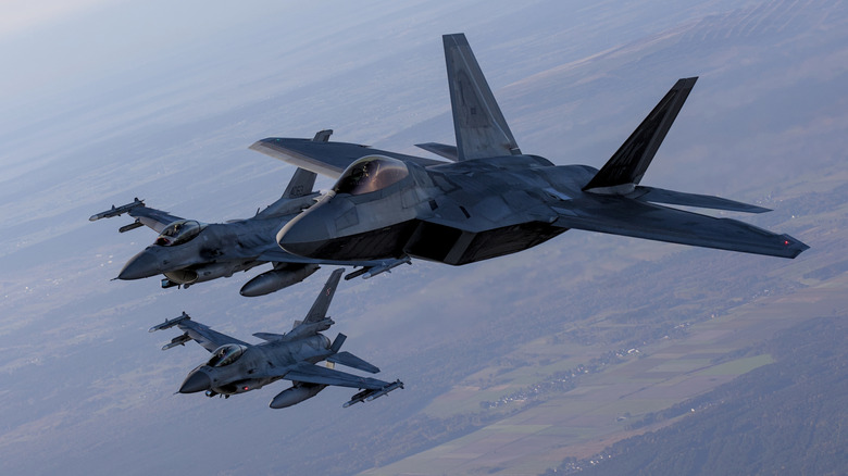 US Air Force F-22 RAPTOR fighter jet flying in formation