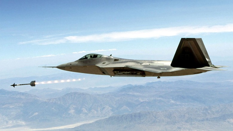 Lockheed Martin F-22 Raptor fires an AIM-9 Sidewinder (Fox Two)