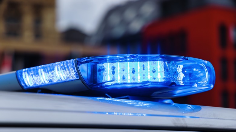 A police car with blue lights on
