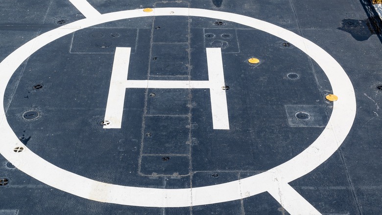 A helipad on the deck of a large ship.