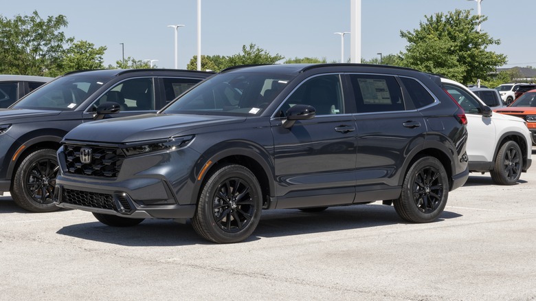 A Honda CR-V Hybrid parked on a street.