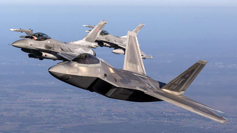 F-22 Raptor fighter jets flying in formation