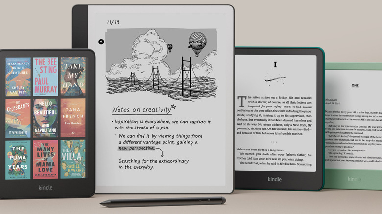 various kindle tablets arranged on a table
