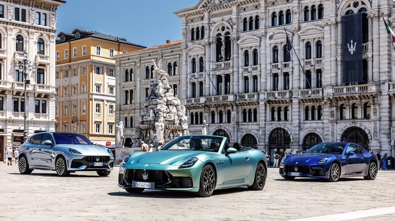 The Maserati Grecale, GranCabriolet, and GranTurismo in a plaza in Trieste, Italy