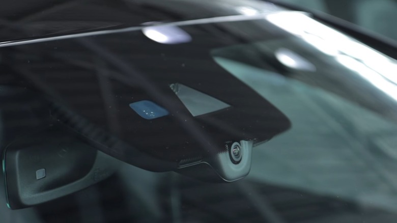 A Mercedes Benz MBUX dashcam as seen through the front windshield.