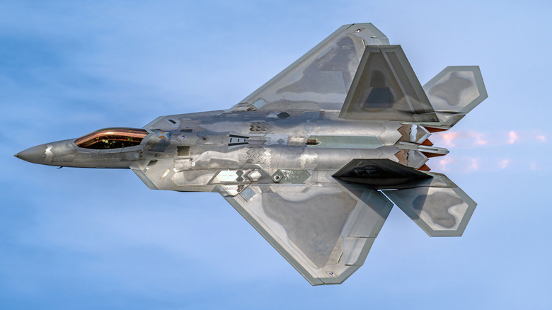 F-22 flying with afterburners engaged