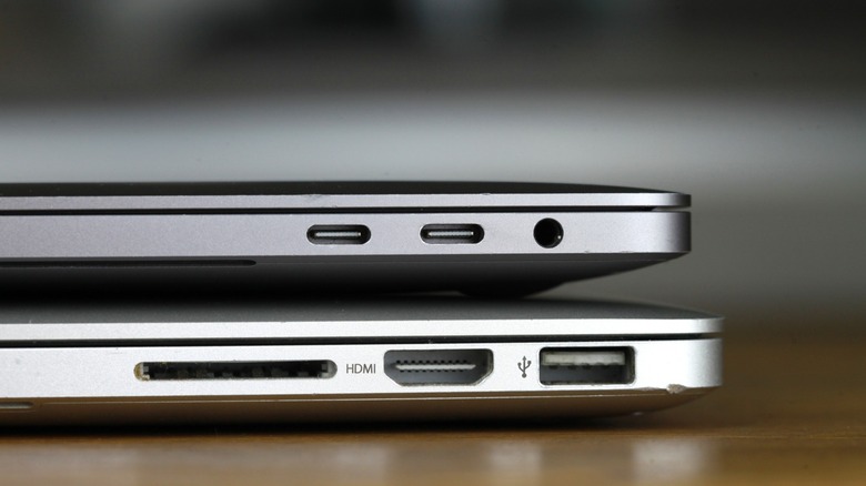 A modern Macbook with just usb-c ports and kept on an older one with other ports