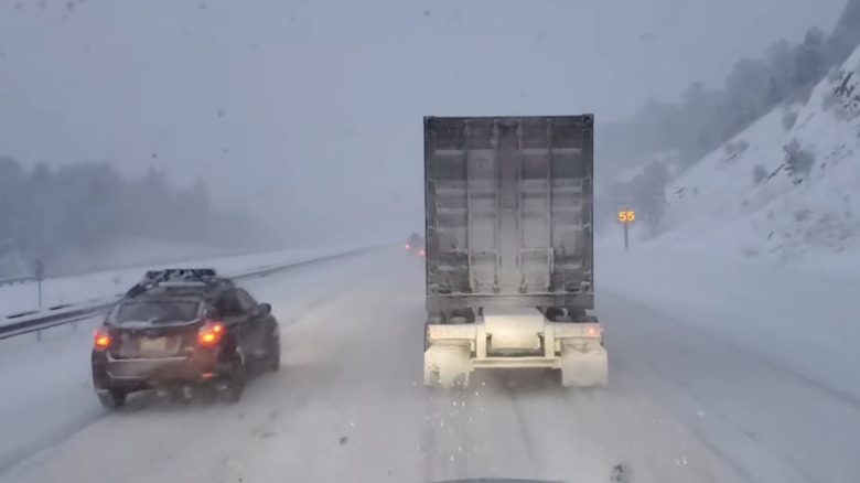 A semi on a snowy highway